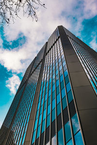 Low angle view of modern building against sky