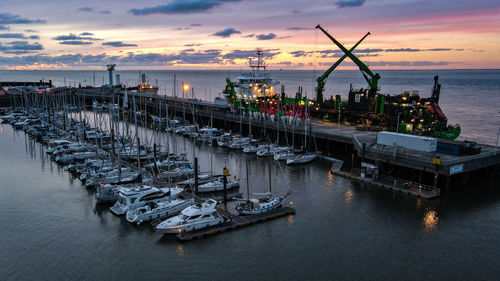 Panoramic view of pier on sea against sky during sunset