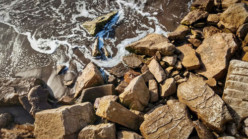 Full frame shot of rocks on shore