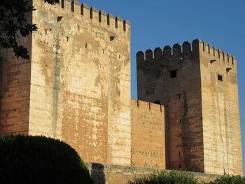 View of old ruin building against sky