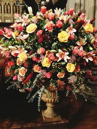Multi colored flowers in vase on table