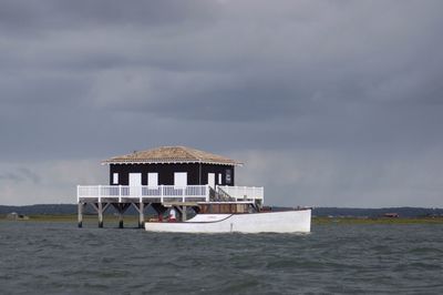 View of sea against cloudy sky