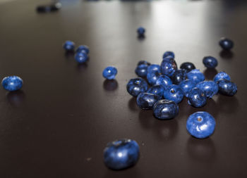 Close-up of blue berries on table