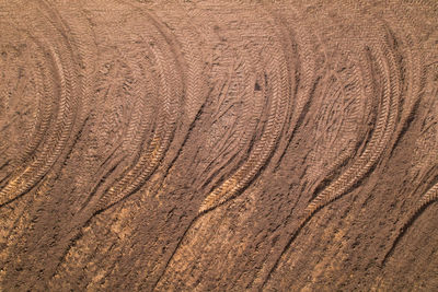 Pattern from tread wheel tracks on a plowed field.