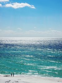 View of seascape against cloudy sky