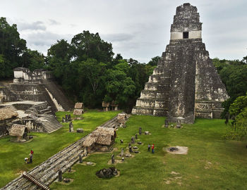 Exterior of old temple at tikal national park against sky