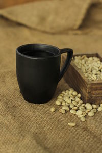 High angle view of coffee cup on table