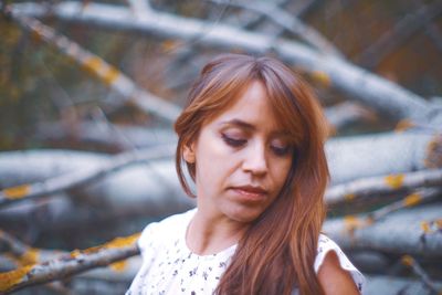 Portrait of beautiful young woman outdoors