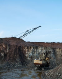 Abandoned construction site against clear sky