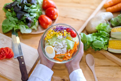 High angle view of fruit salad in bowl on table