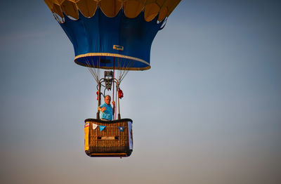 Low angle view of hot air balloon against clear sky