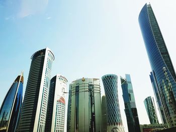 Low angle view of modern buildings against clear sky