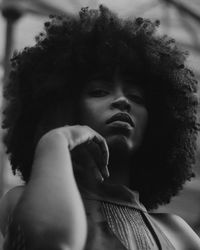 Close-up portrait of young woman looking away