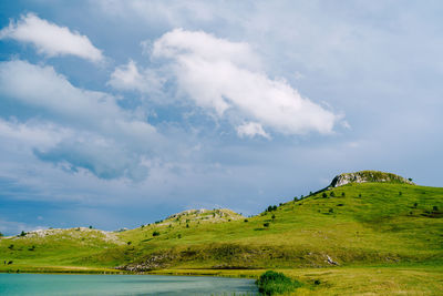 Scenic view of land against sky