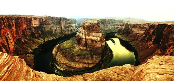 Panoramic view of rock formations against sky