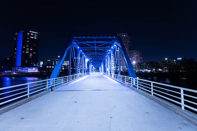  blue bridge of downtown grand rapids glows vibrant after dark