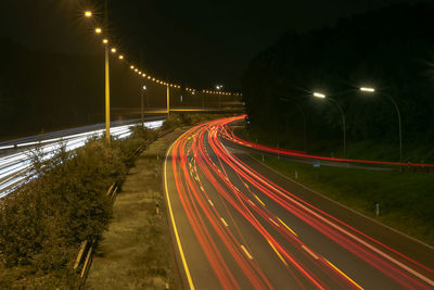 Light trails on road at night