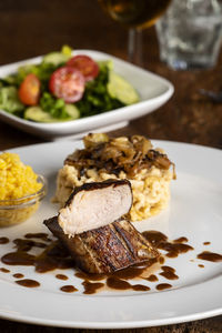 Close-up of food in plate on table