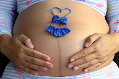 Close-up of woman with hands