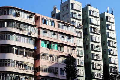 Low angle view of buildings against clear sky