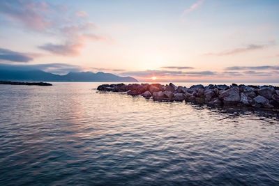 Scenic view of sea against sky during sunset