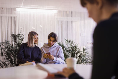 People sitting in waiting room