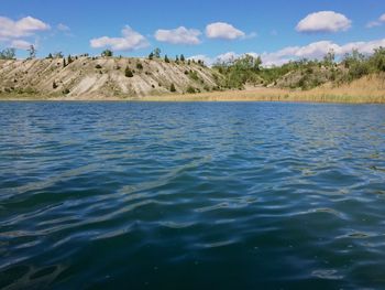 Scenic view of rippled water against sky