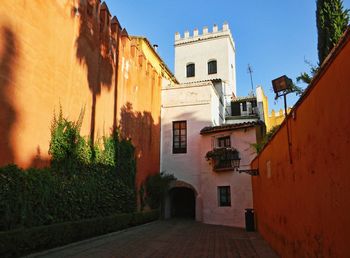 Narrow alley with buildings in background