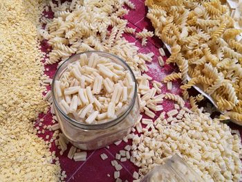 High angle view of raw pastas on table