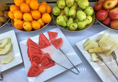 High angle view of fruits in plate on table