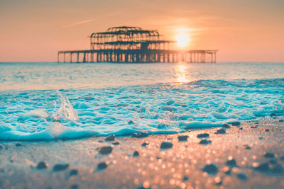 Scenic view of sea against sky during sunset