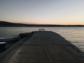 Scenic view of sea against clear sky during sunset