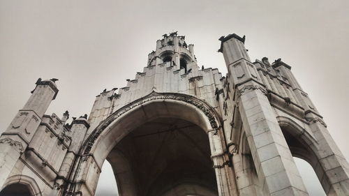 Low angle view of victoria memorial against sky