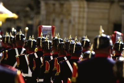 Rear view of people at military parade