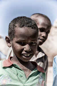 Close-up portrait of smiling boy