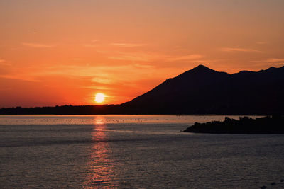 Scenic view of sea against sky during sunset