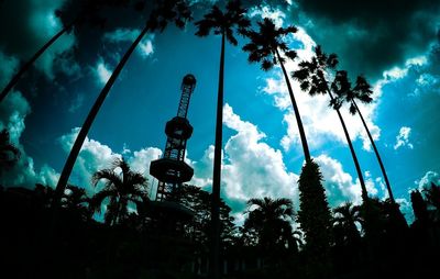 Low angle view of silhouette street light against sky