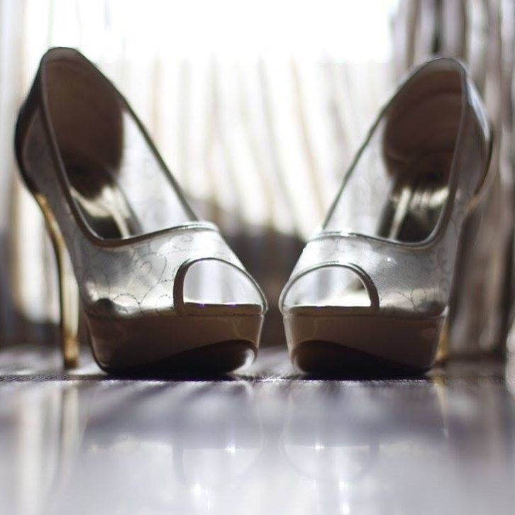 indoors, still life, close-up, table, focus on foreground, shoe, two objects, empty, pair, fashion, chair, selective focus, absence, metal, personal accessory, single object, no people, glass - material, footwear, side by side