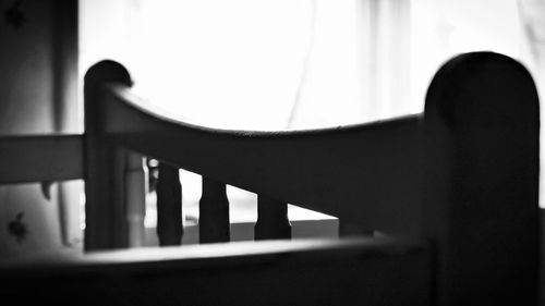 Close-up of person on staircase at home