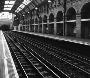 Empty tracks at railroad station platform