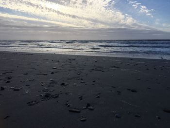 Scenic view of beach against sky