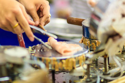 Close-up of hands playing