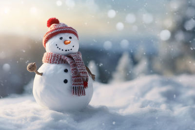 Close-up of snowman on snow