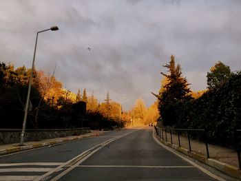 View of road against cloudy sky