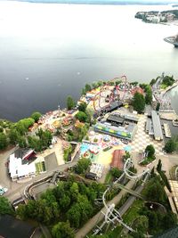 High angle view of town by sea