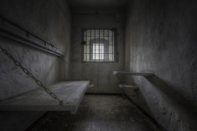 Interior of abandoned prison cell