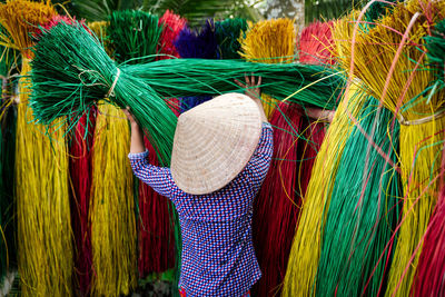 Vietnamese women drying traditional vietnam mats in the old traditional village at vietnam