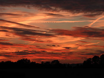 Scenic view of dramatic sky during sunset
