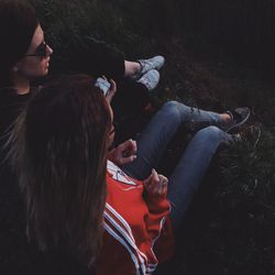 High angle view of people sitting on floor