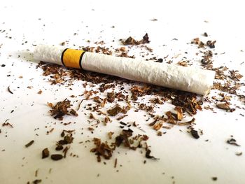 High angle view of cigarette on table